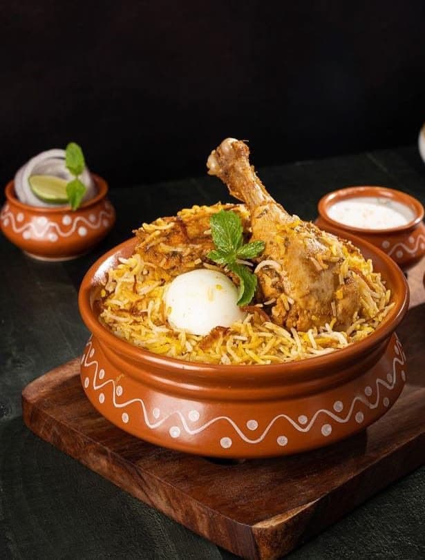 Nawab's Butter Chicken Dum Biryani